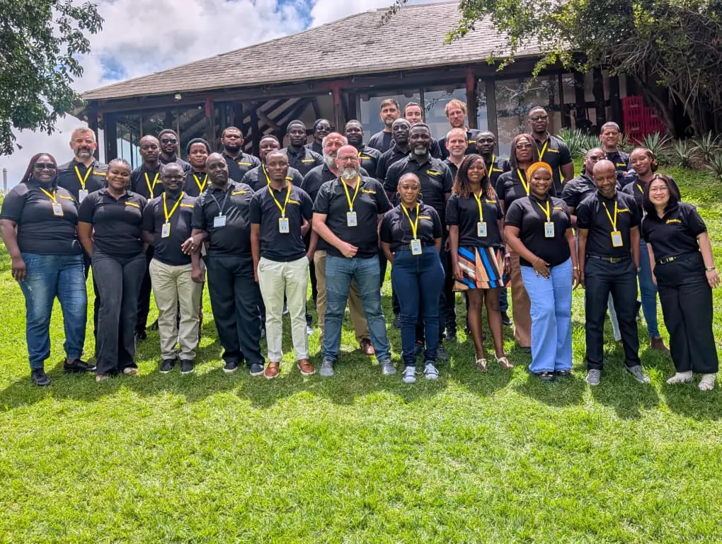 Desalytics colleagues gathered outdoors for a group photograph