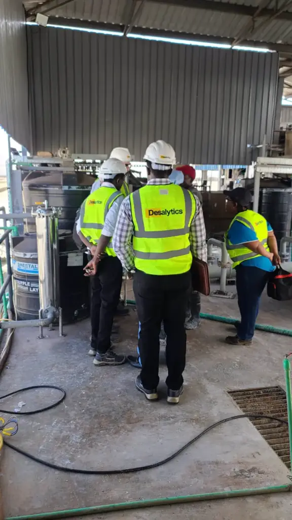 A Desalytics team visiting water treatment equipment